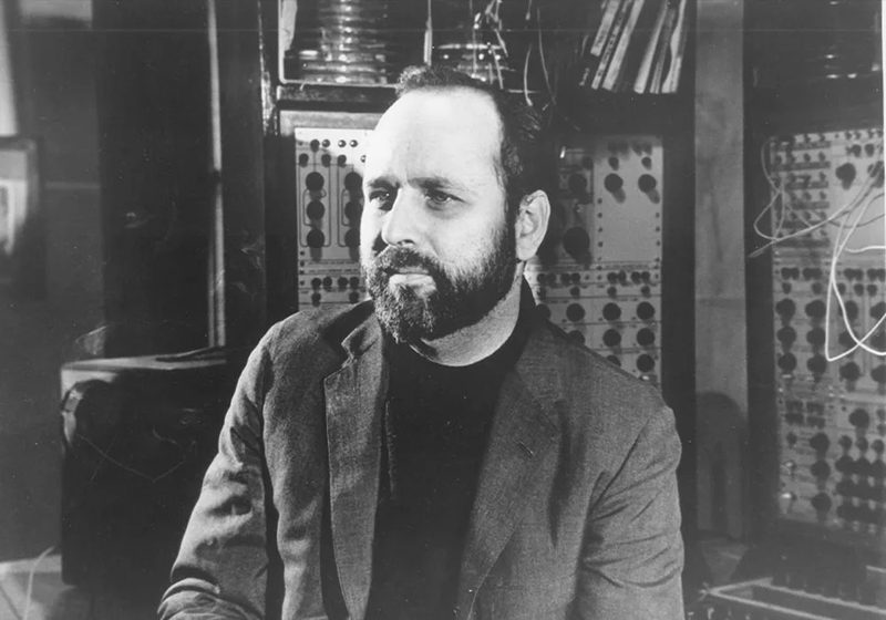 Morton Subotnick beside a modular synthesizer