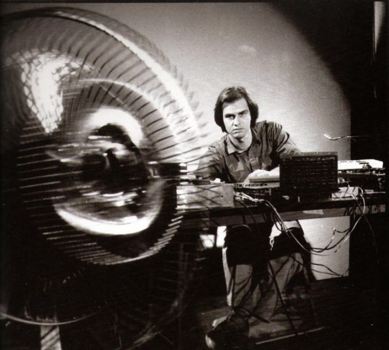 Ron Kuivila with a hand-held electric fan and live-electronics setup
