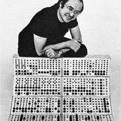 Serge Tcherepnin leaning on an early Serge modular system, circa 1978