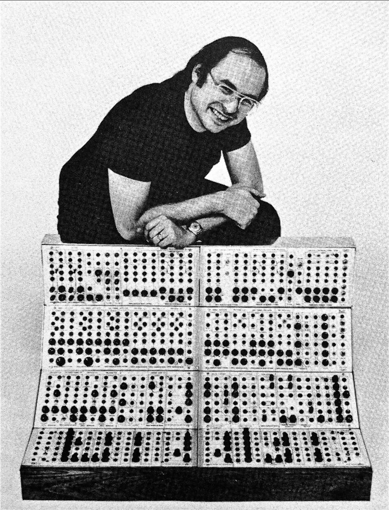 Serge Tcherepnin leaning on an early Serge modular system, circa 1978