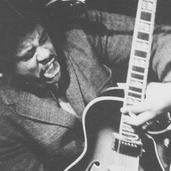 Sonny Sharrock playing electric guitar