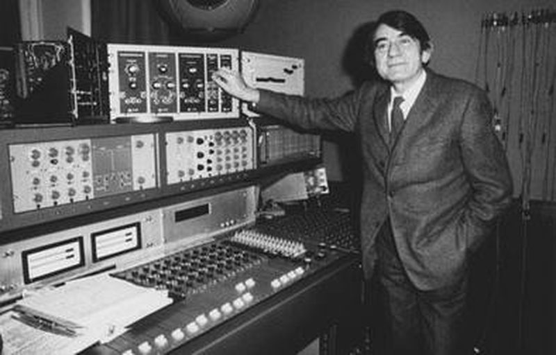 Pierre Schaeffer at the Studio 54 mixing desk, adjusting a Moog synthesizer, with a Coupigny synthesizer in the row below