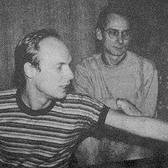 Jon Hassell and Brian Eno in the studio at a mixing console